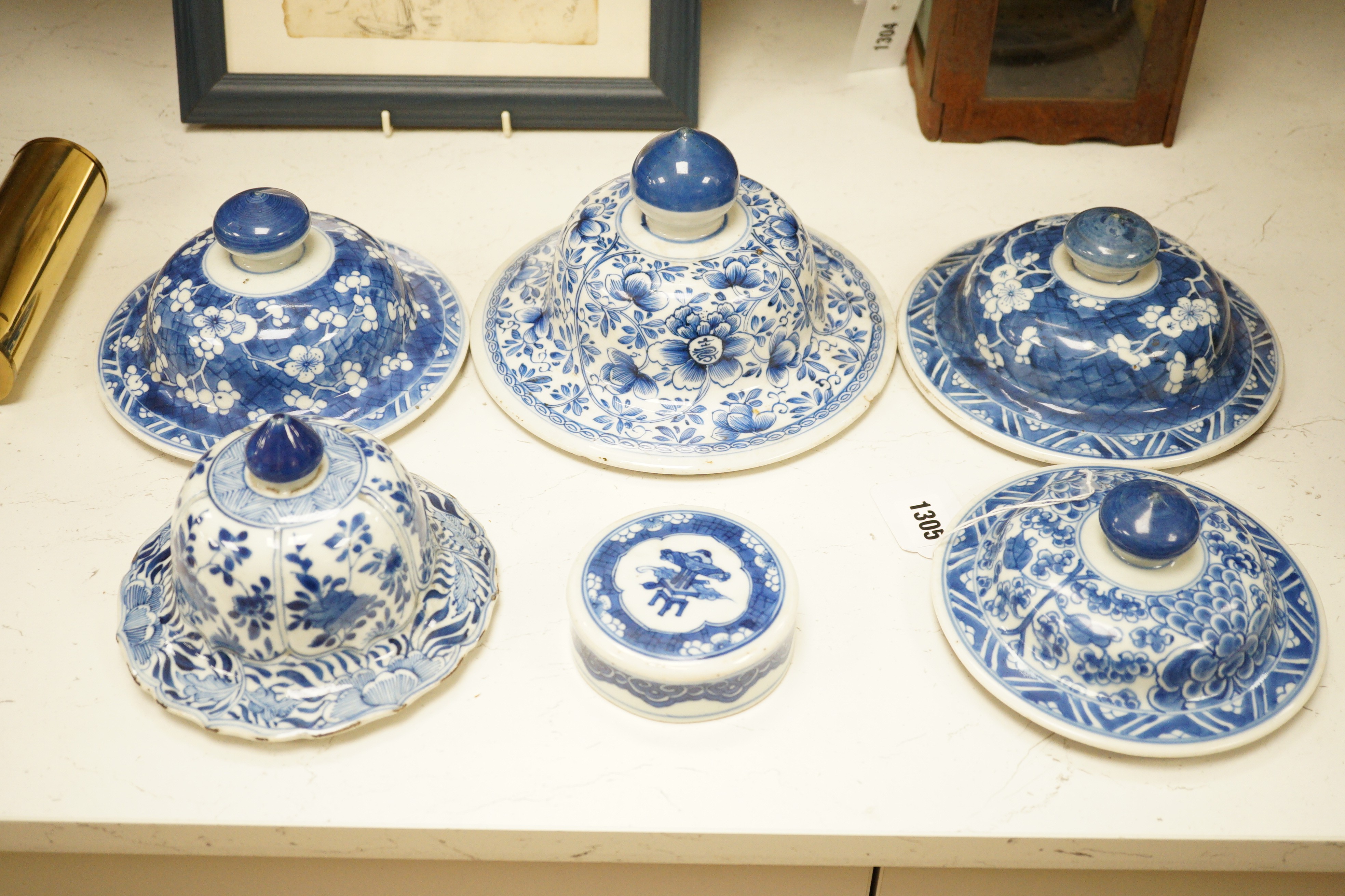 Six Chinese Kangxi blue and white vases and jar covers, largest 21.5cm diameter., Provenance - D.C.Monk & Son, former dealers based in Kensington Church Street, London W8